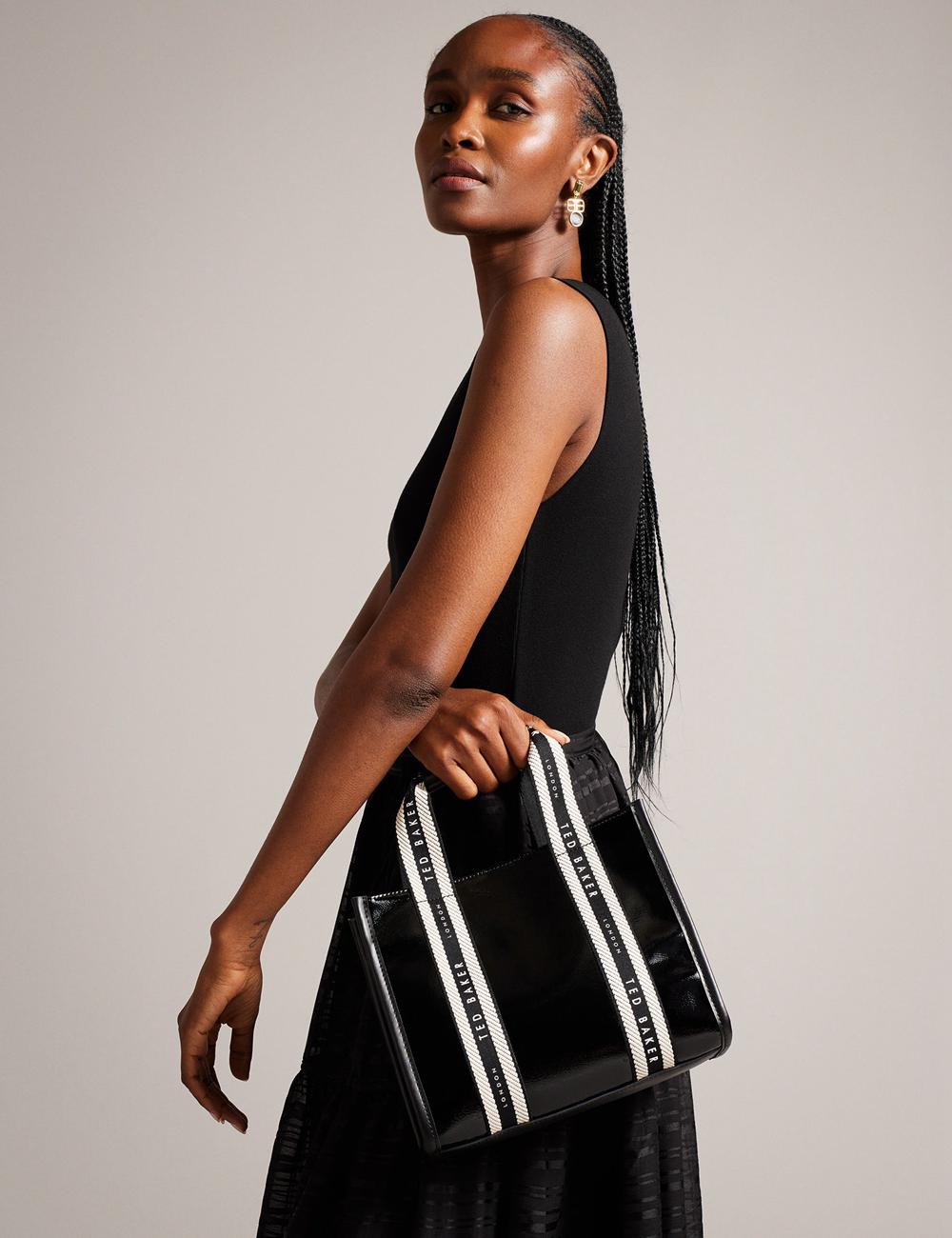 Women Ted Baker CELIANE - Branded Webbing Patent Small Tote Bags Black | HBDL19647