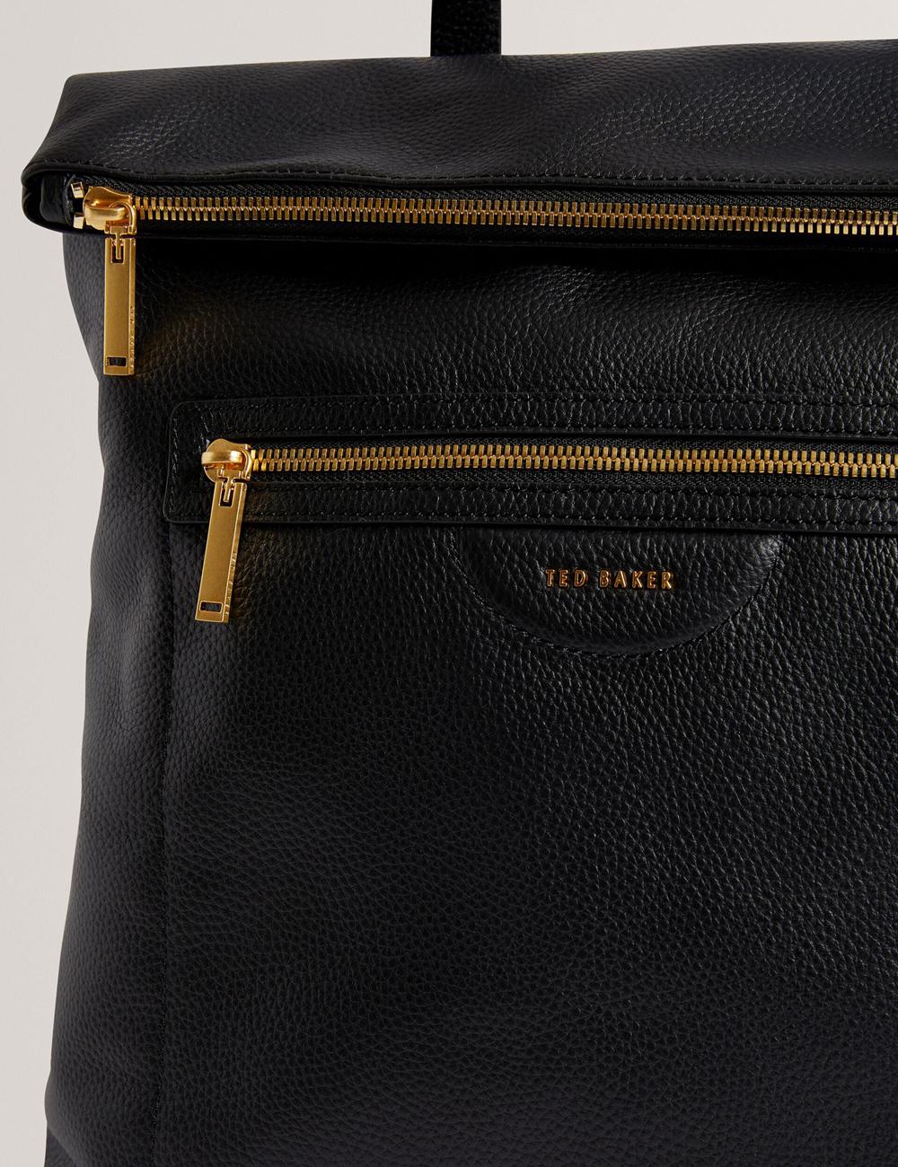 Women Ted Baker ESSAYA - Leather Webbing Strap Fold Over Backpacks Black | HUZV05934