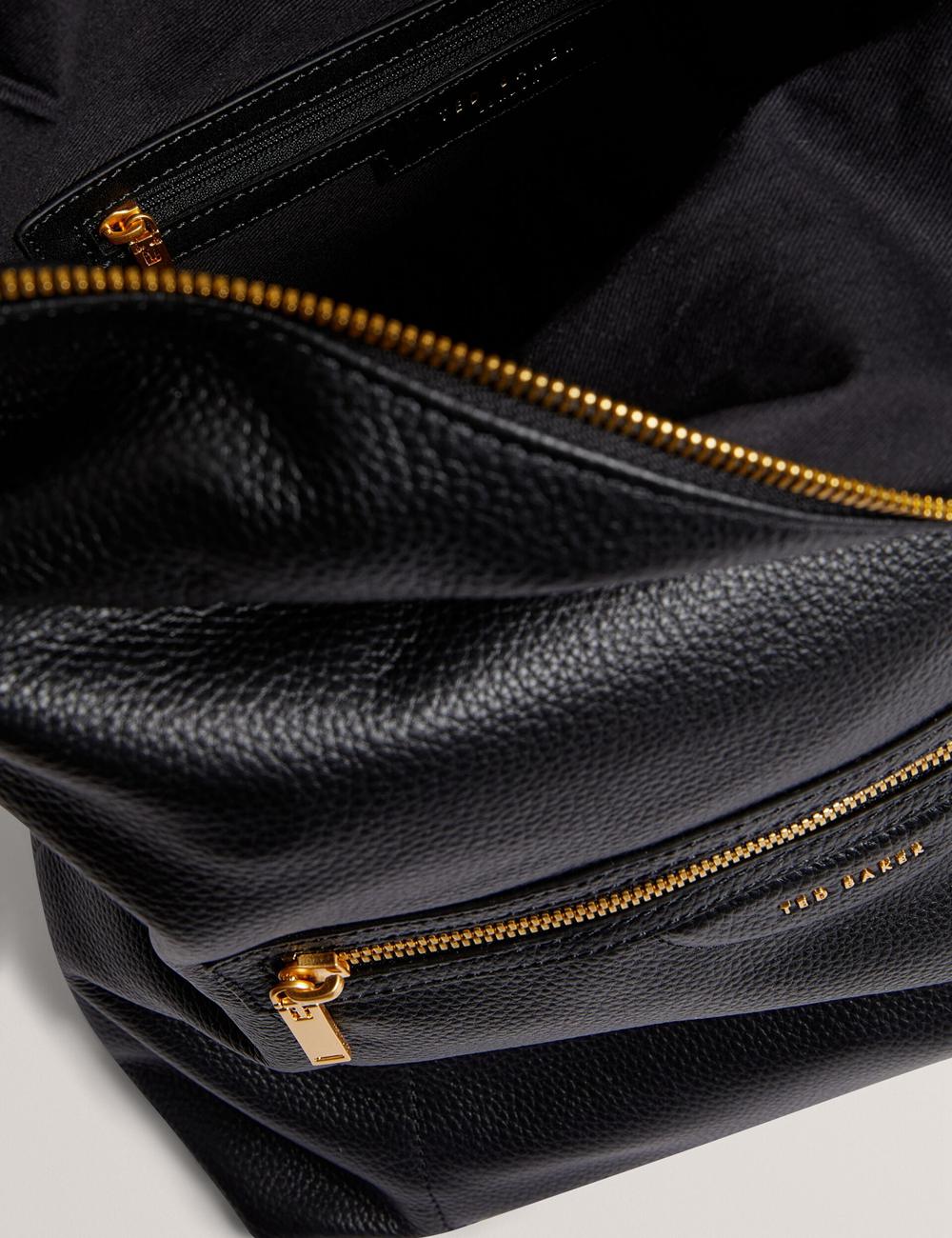Women Ted Baker ESSAYA - Leather Webbing Strap Fold Over Backpacks Black | HUZV05934